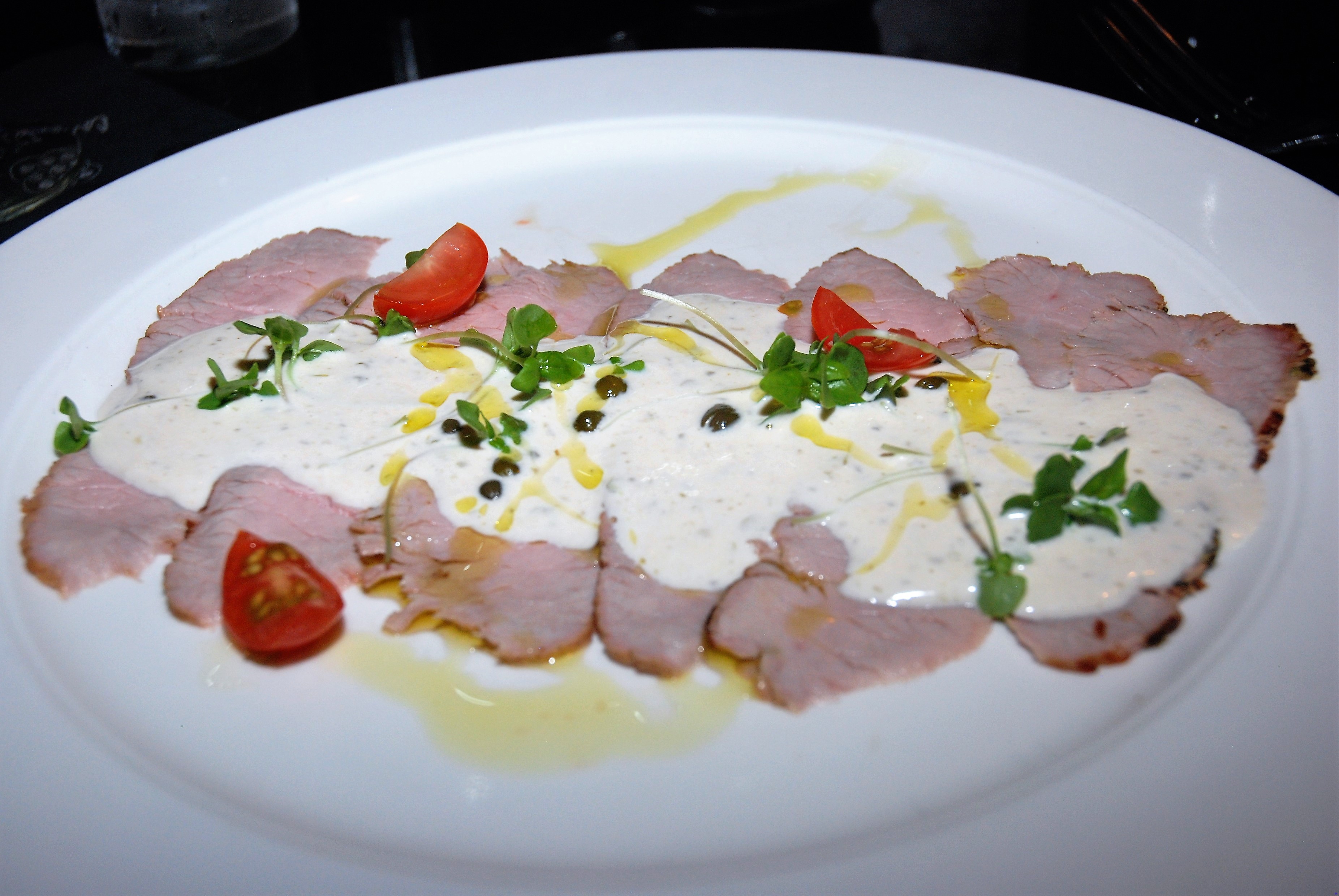 Vitello Tonnato Chilled thin veal with creamy Italian Tuna & caper sauce